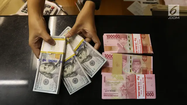 Rupiah ditutup melemah 68 poin terhadap dolar Amerika Serikat (USD), setelah melemah 75 poin di level Rp 16.210 dari penutupan sebelumnya di level Rp 16.142.  (Liputan6.com/Angga Yuniar )